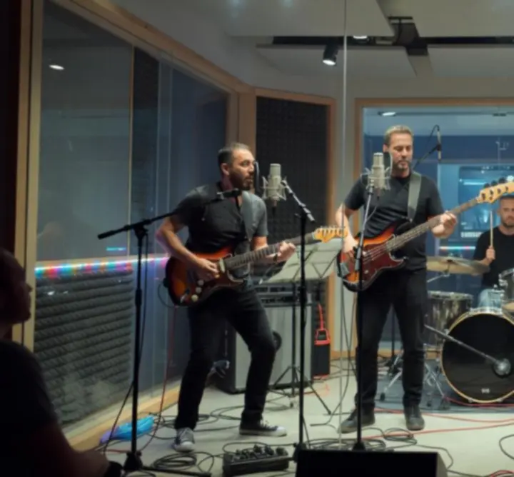 Live band performing in a recording session at BEE BOPS MUSIC LTD